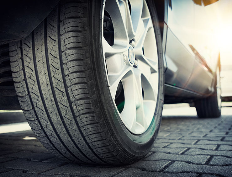 a close up of a tire on a car